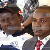 Suspended Higher Education Minister William Ruto and Christopher Wanjau, Acting District Commissioner for Eldoret West District
