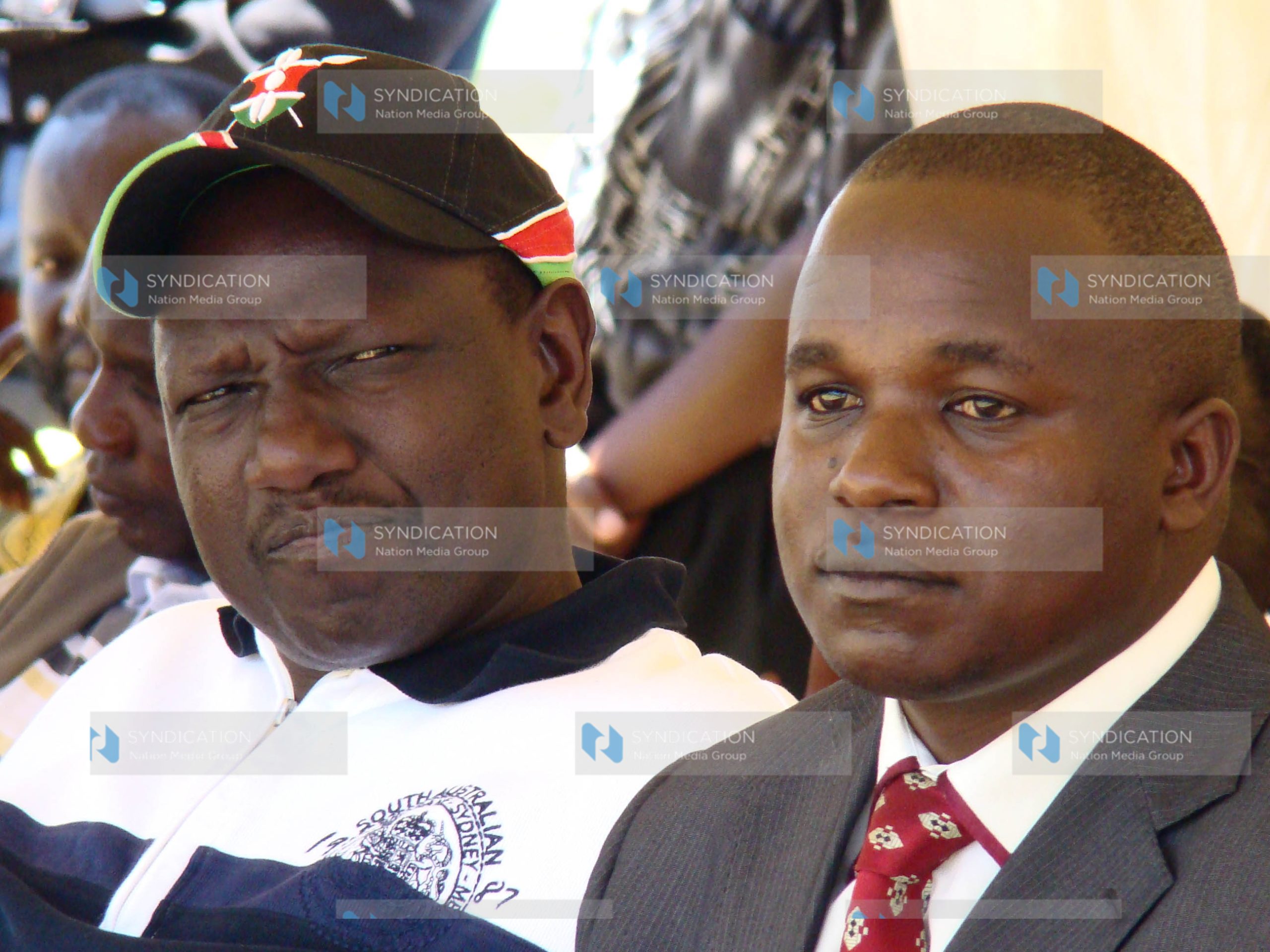 Suspended Higher Education Minister William Ruto and Christopher Wanjau, Acting District Commissioner for Eldoret West District
