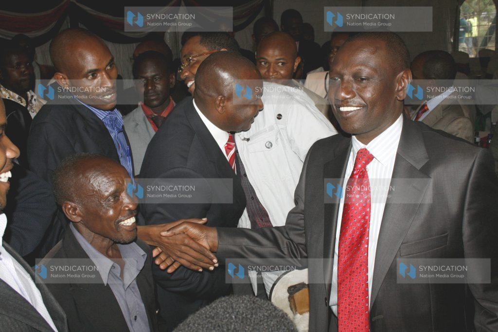 Higher Education minister William Ruto greets his supporters