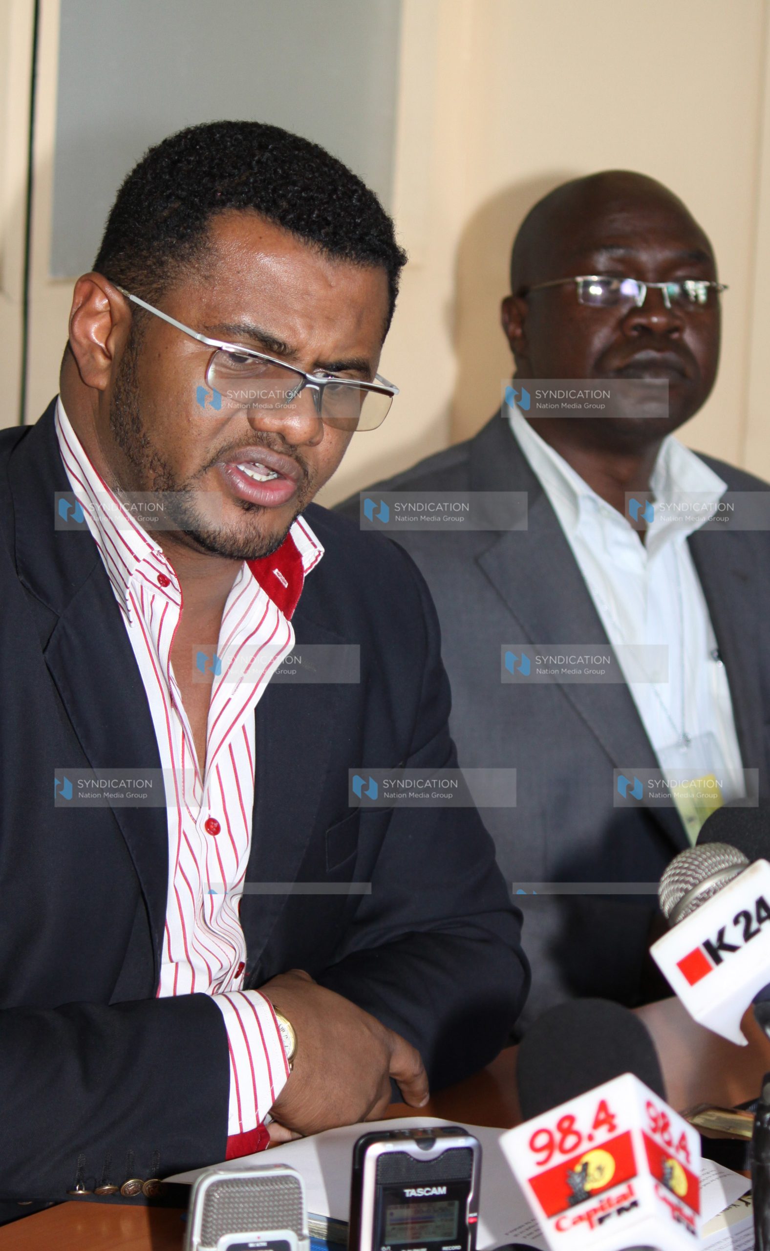 Kenya National Human Commission on Human Rights commissioner Hassan Omar flanked with commissioner John Wamwanga