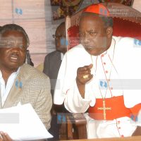 John Cardinal Njue (Right) speaks with COTU secretary General Francis Atwoli