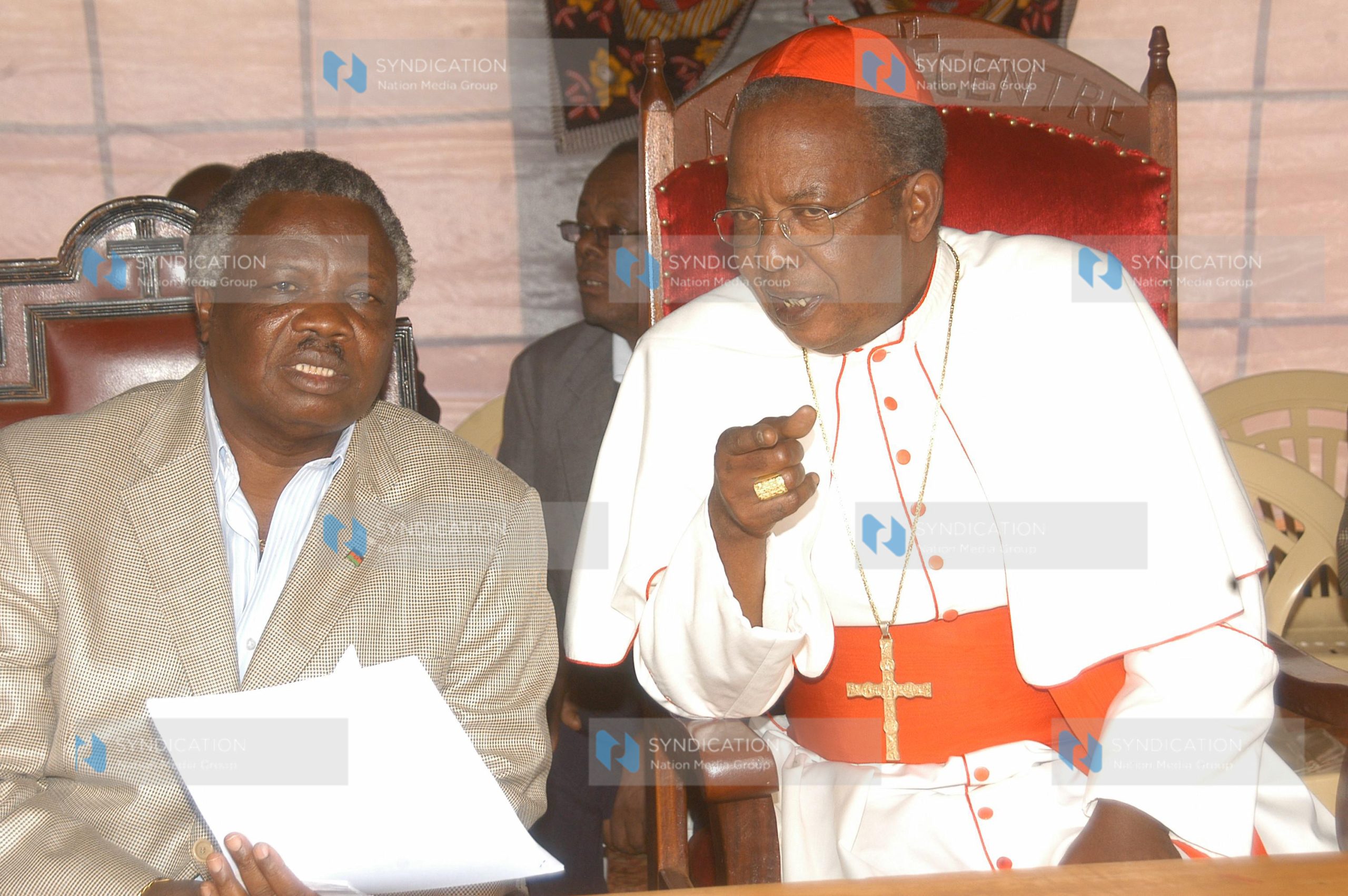 John Cardinal Njue (Right) speaks with COTU secretary General Francis Atwoli