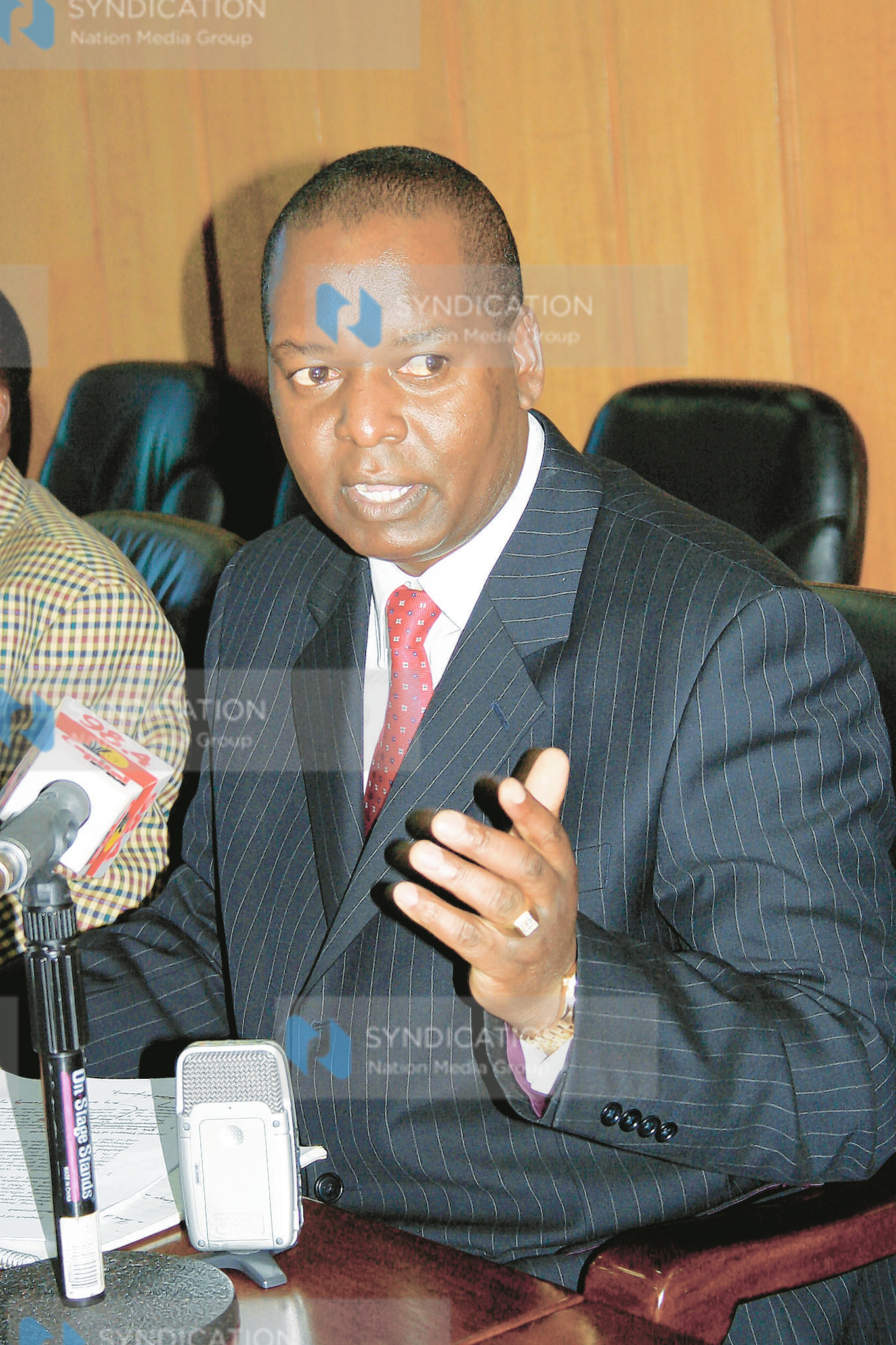 Finance minister Amos Kimunya addresses a press conference