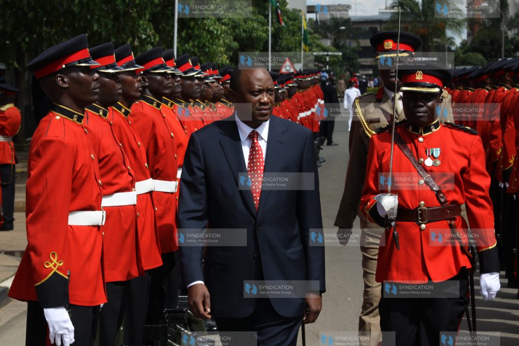 President Uhuru Kenyatta carries out his first guard of honour