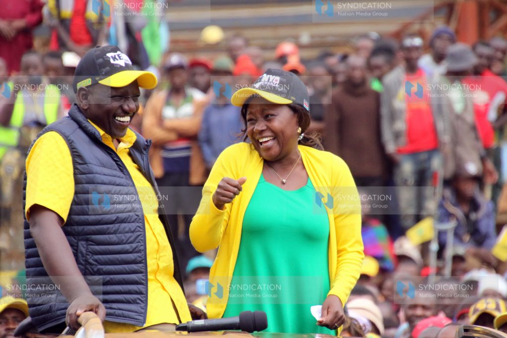 Deputy President William Ruto chats with Embu UDA gubernatorial candidate Cecily Mbarire