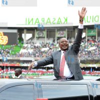 President Uhuru Kenyatta acknowledges greetings from wananchi