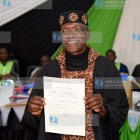 Senator elect Dr Boni Khalwale displaying IEBC certificate