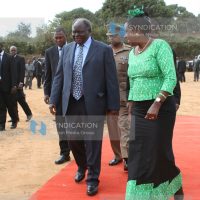President Mwai Kibaki (left)