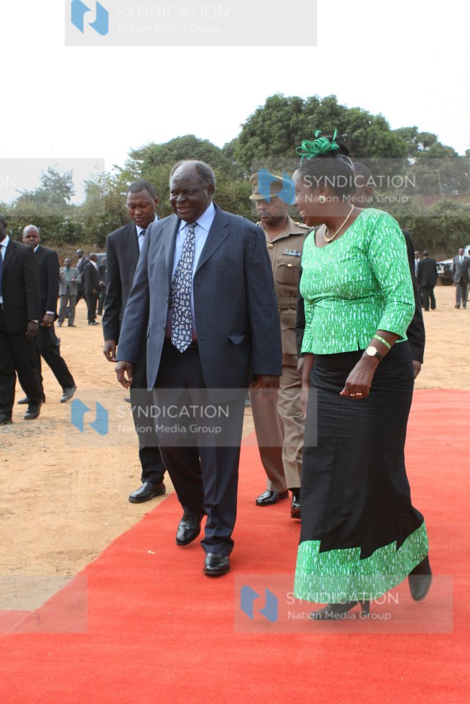 President Mwai Kibaki (left)