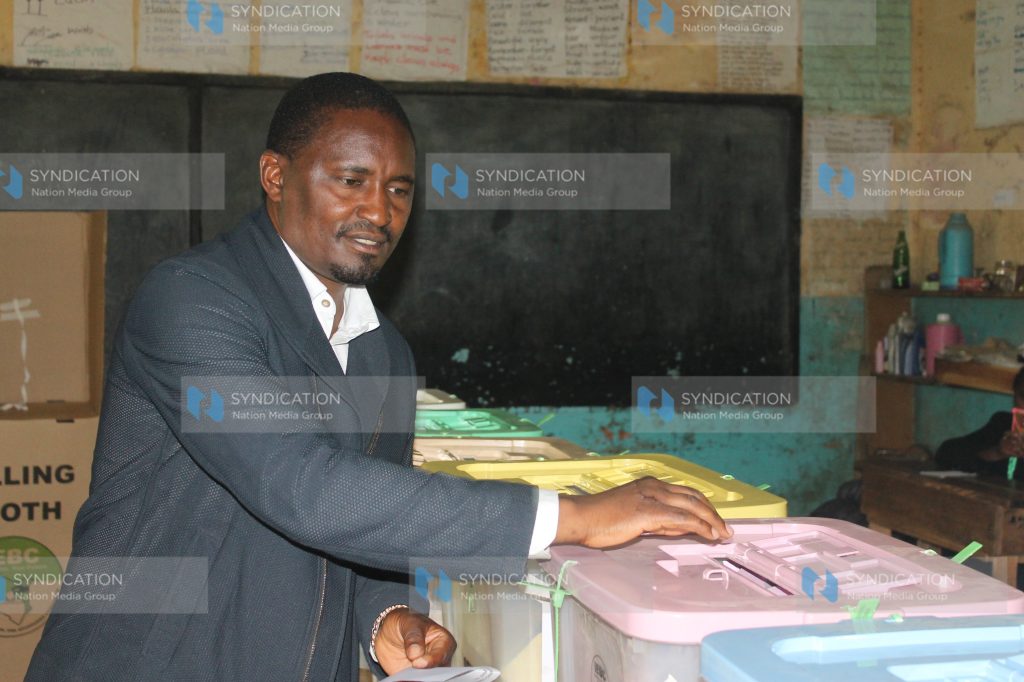 Mwangi Kiunjuri votes at Nanyuki Primary School Polling Centre