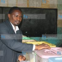 Mwangi Kiunjuri votes at Nanyuki Primary School Polling Centre