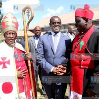 Meru Governor Kiraitu Murungi (center) chats with AIPCA Archbishop Julius Njoroge Gitau