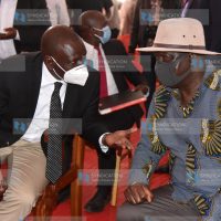 Deputy President William Ruto confers with ODM leader Raila Odinga