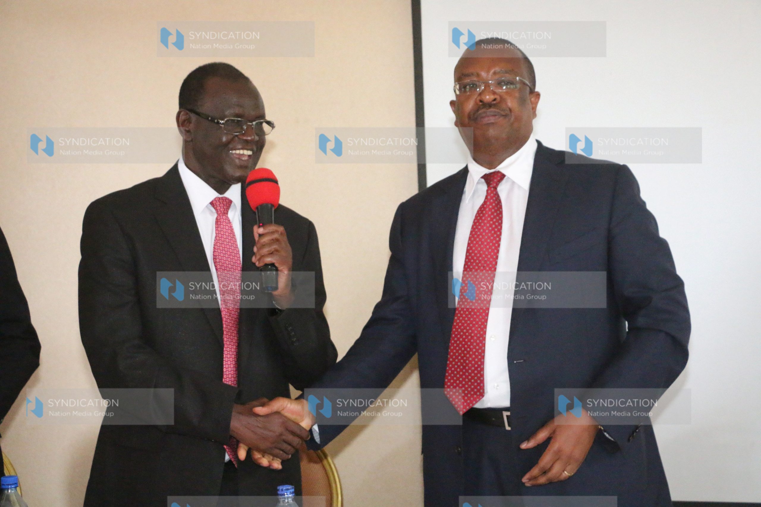Meru Governor Kiraitu Murungi and Cooperative Bank CEO Dr Gideon Muriuki