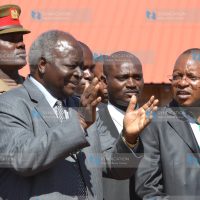 President Mwai Kibaki in a happy moment at Giathenge trading center in Othaya