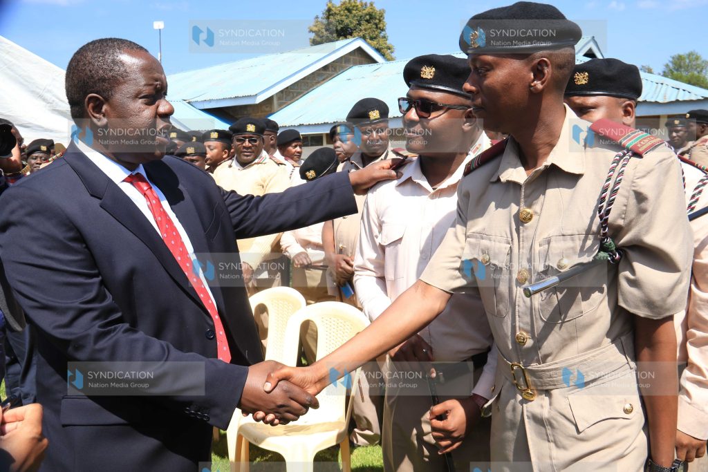 Interior Cabinet Secretary Fred Matiang'i greets administrators