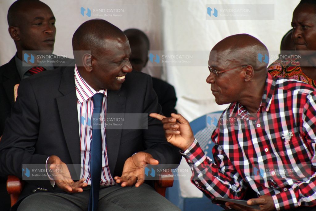 Deputy President William Ruto confers with Kakamega Senator Dr. Boni Khalwale