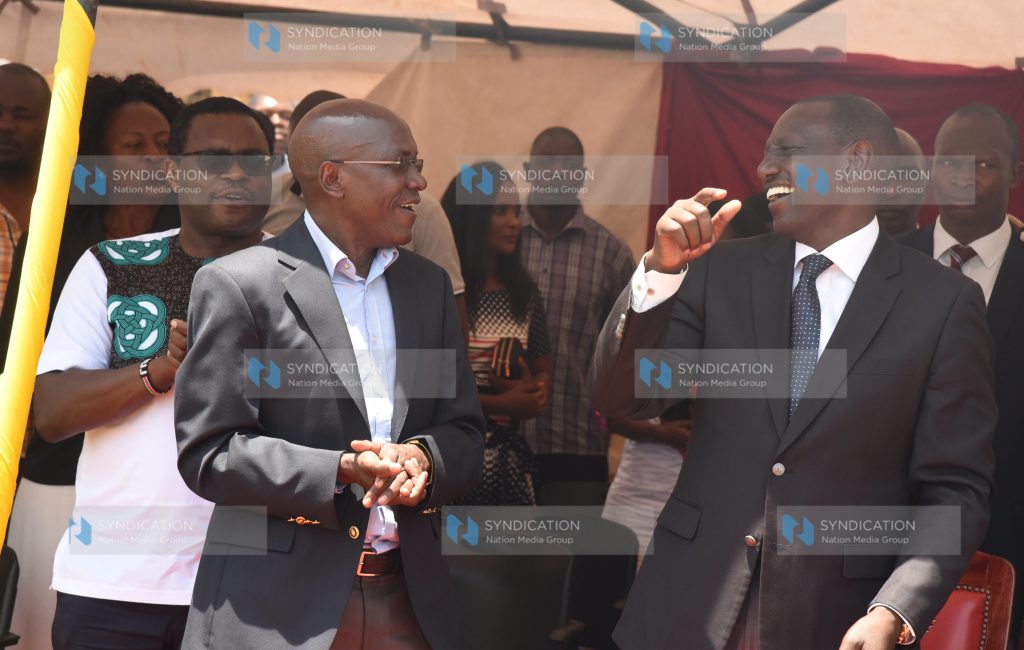 Deputy President William Ruto converses with former Kakamega Senator Dr. Boni Khalwale