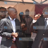 Deputy President William Ruto converses with former Kakamega Senator Dr. Boni Khalwale