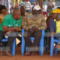 Deputy President William Ruto chats with James Mbaluka and Daniel Musau