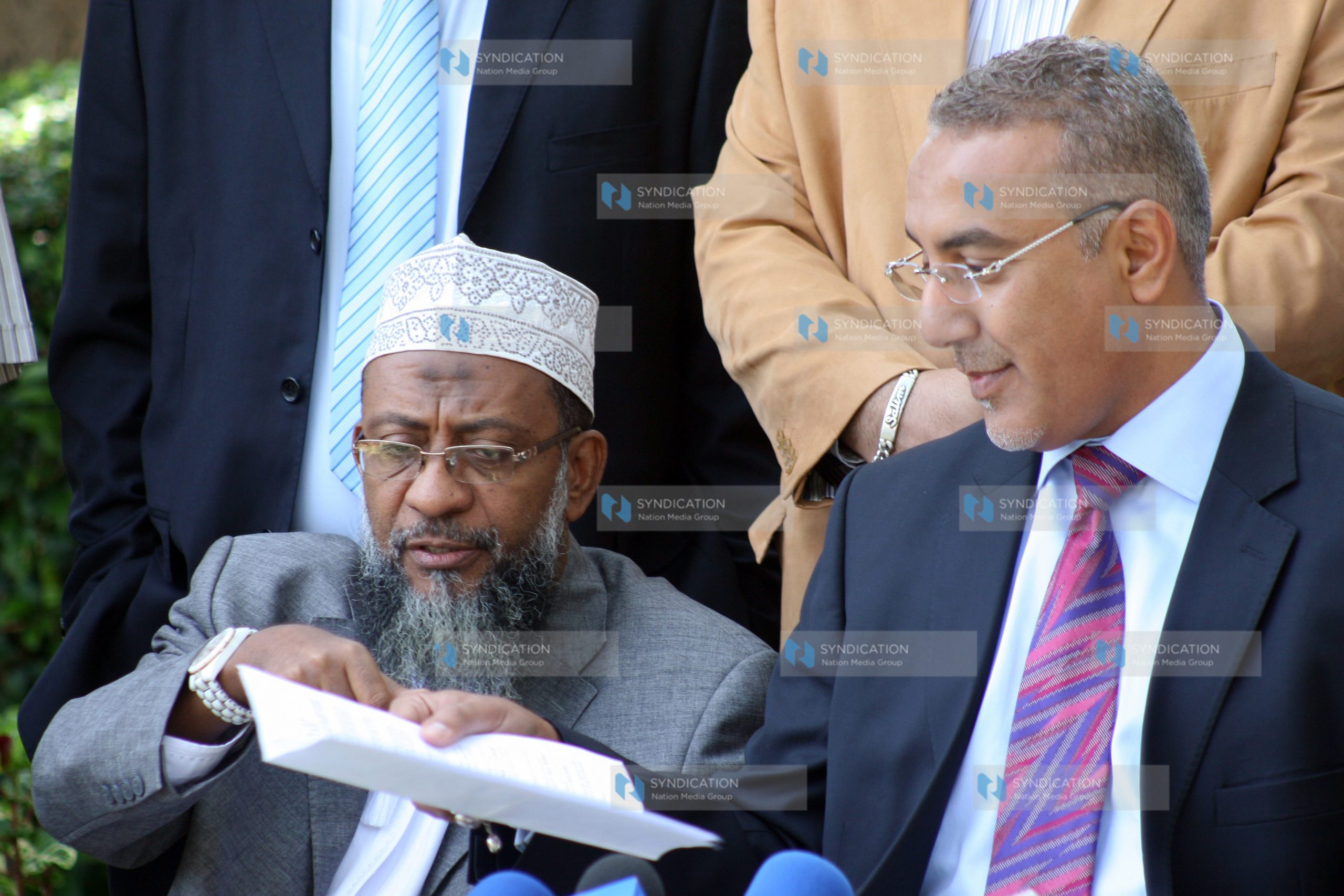 Najib Balala flanked by nominated MP Sheikh Dor address a press conference
