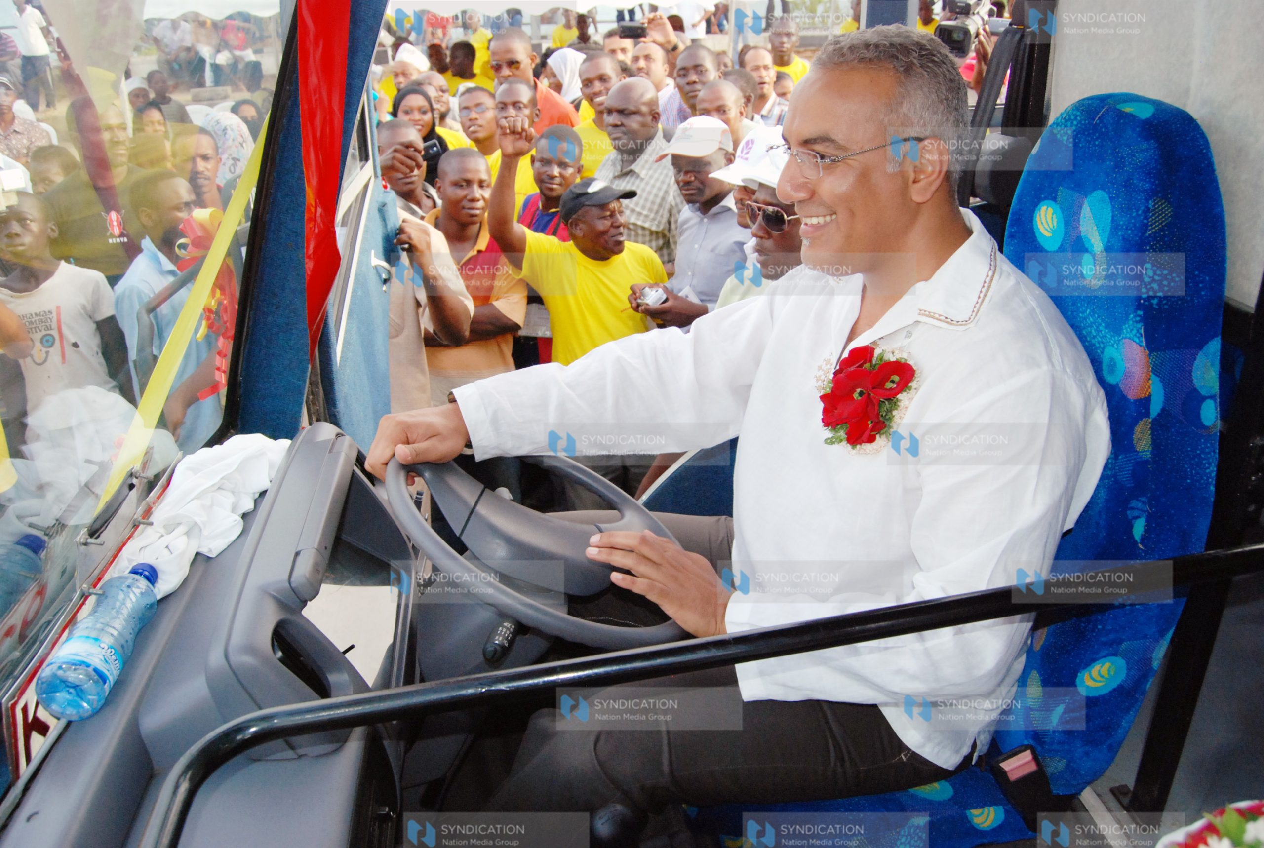 Tourism Minister Najib Balala tries to drive off a manyanga minibus