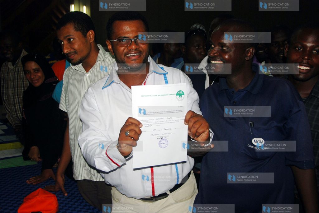 Senator candidate Mr.Hassan Omar displaying his clearance certificate
