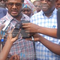 Hassan Omar and Senate Legal Affairs Committee Chairman Amos Wako address the media