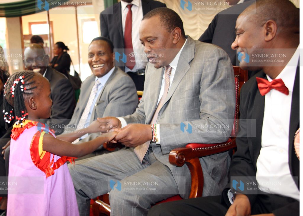 Emily Wanjiru of Gachororo ECD with President Uhuru Kenyatta