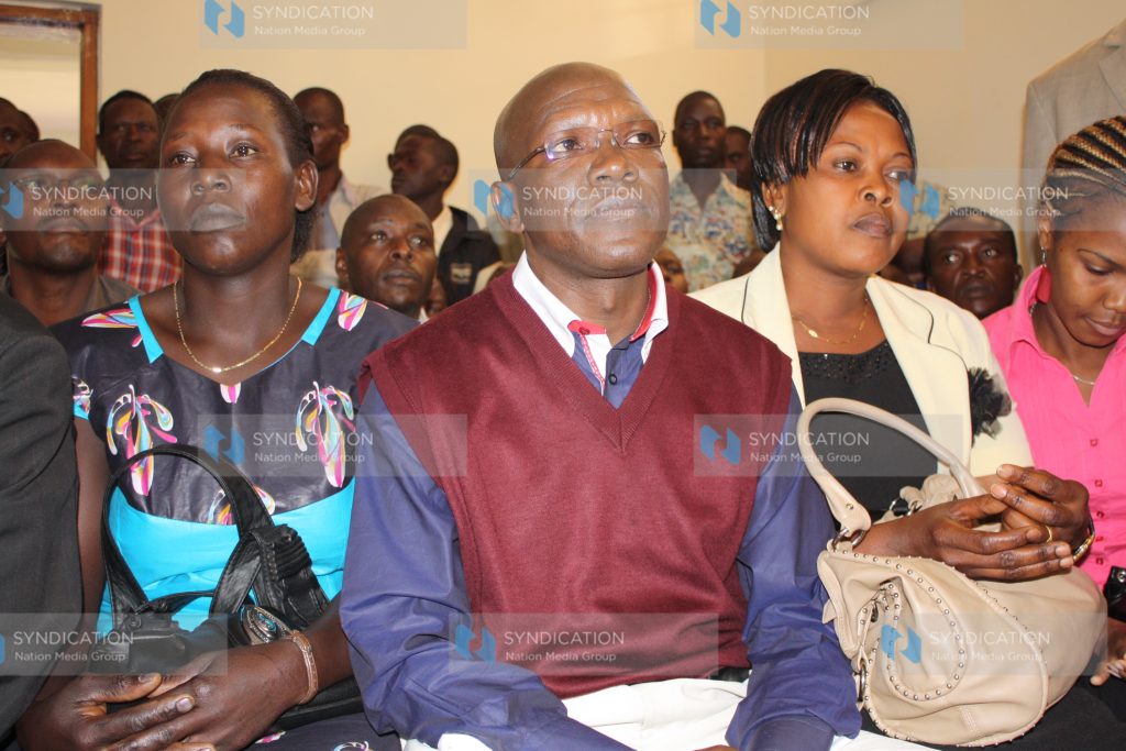 Ikolomani MP Boni Khalwale and wives Adelide Shikanga and Josephine