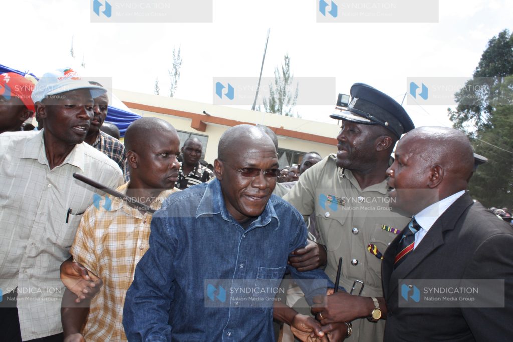 Ikolomani MP Dr. Boni Khalwale arrives at a function