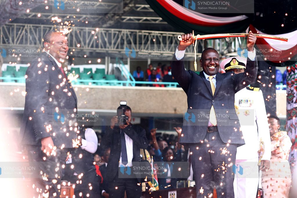 Incoming President William Ruto receives sword from Outgoing President Kenyatta