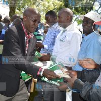 Senator of Kakamega Boni Khalwale distribute his governor manifesto booklets