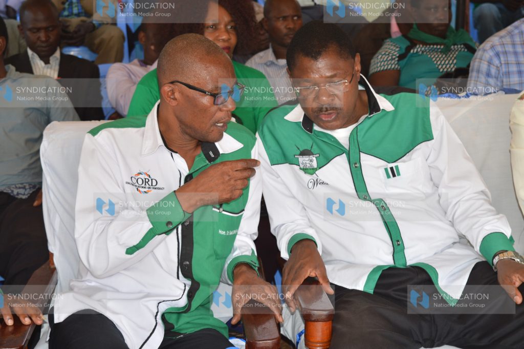 CORD co-principal Moses Wetangula confers with Ford Kenya Secretary General Eseli Simiyu