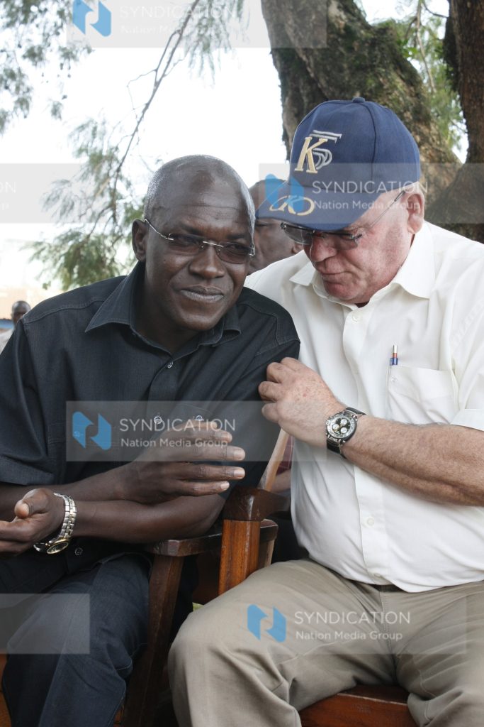 The MP of Ikolomani Dr. Boni Khalwale with contractor Nahum Metal