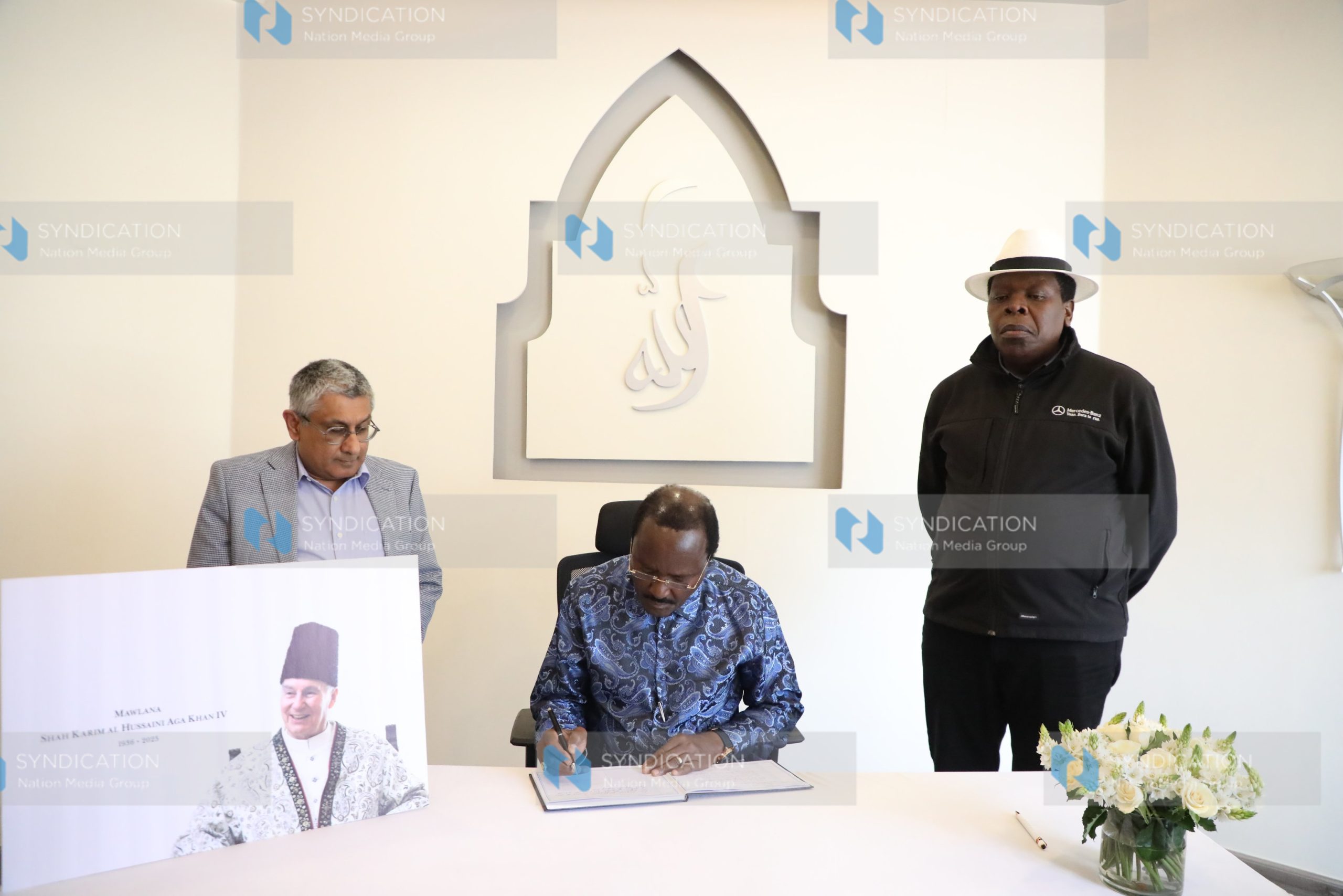 Kalonzo Musyoka as he signs a condolence book at Aga Khan Hospital