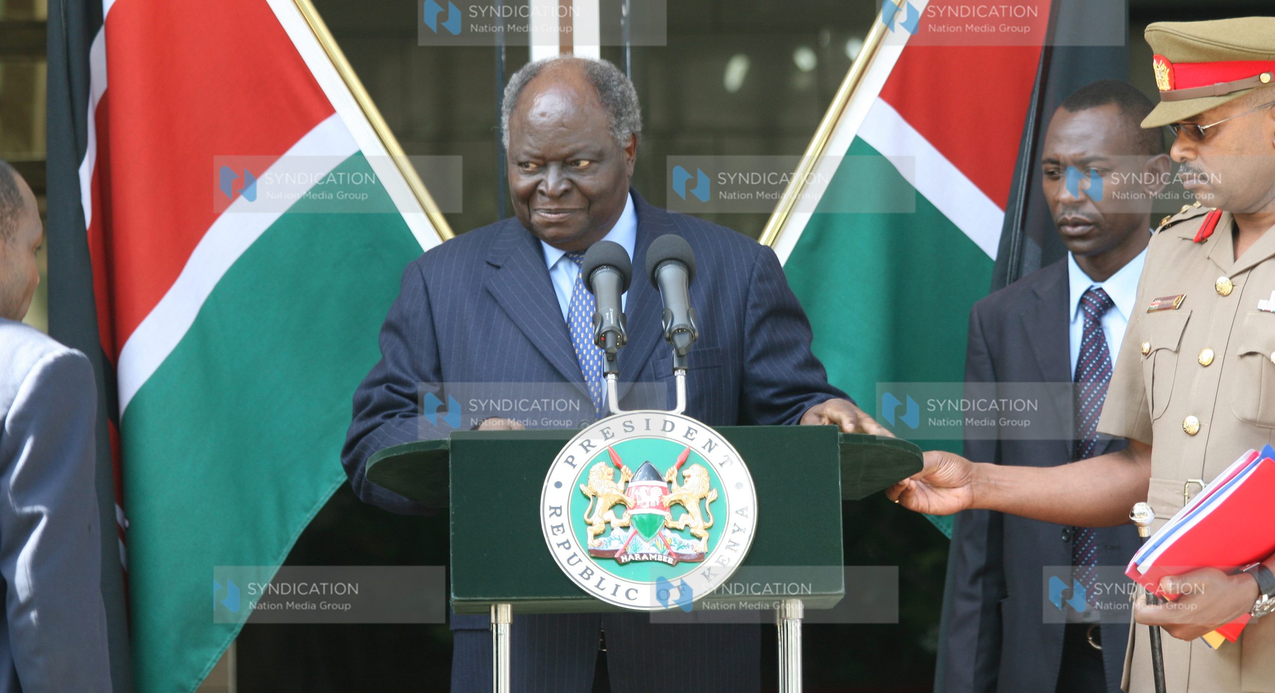 President Mwai Kibaki addresses the press at his Harambee House