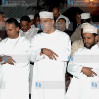 Tourism Minister Najib Balala (center) joins Muslim faithful