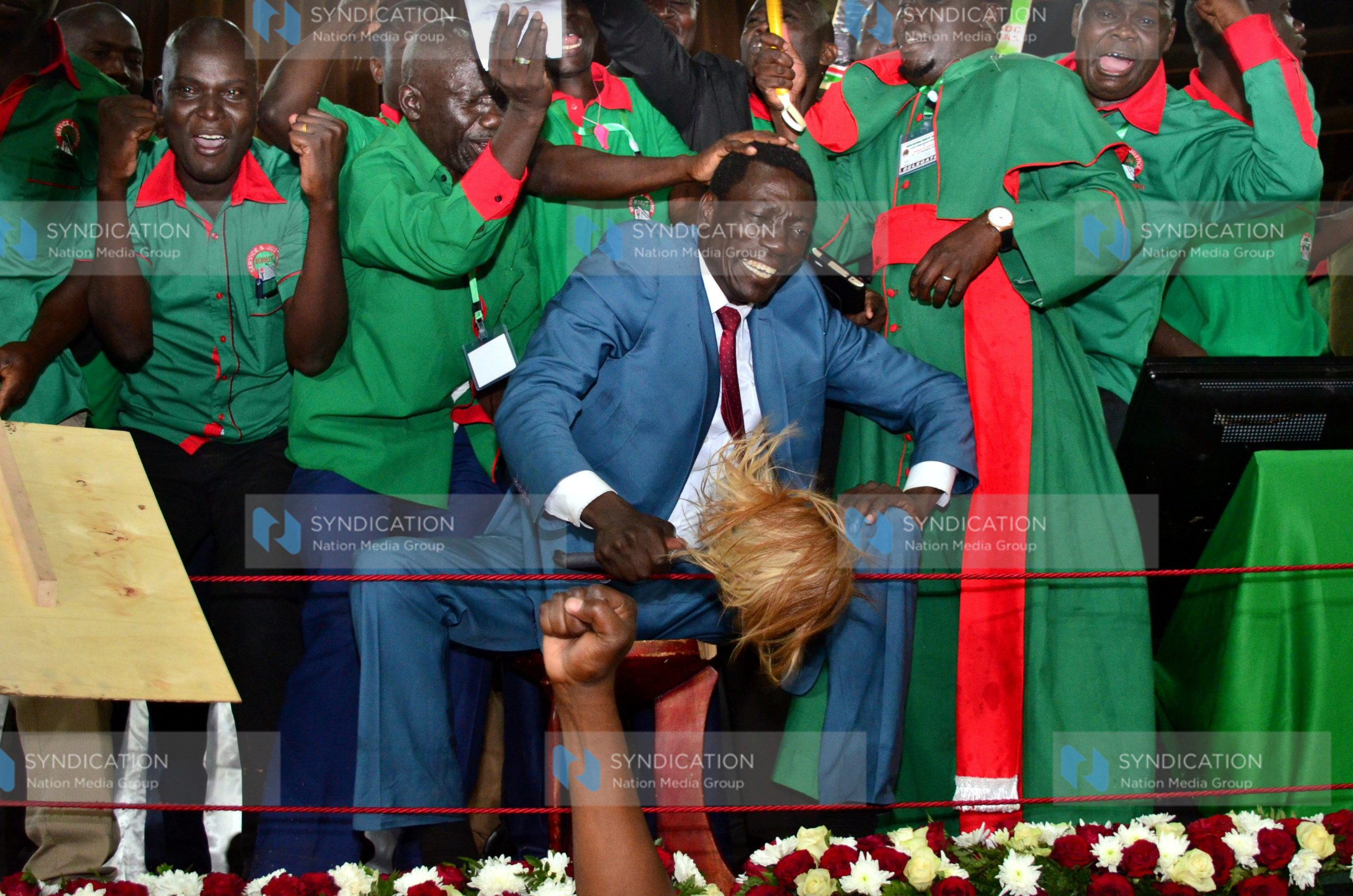(KNUT) 1st National Vice Chairman Collins Henry Oyuu (seated)