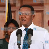 Alfred Mutua gestures while chatting with a section of Machakos MCAs
