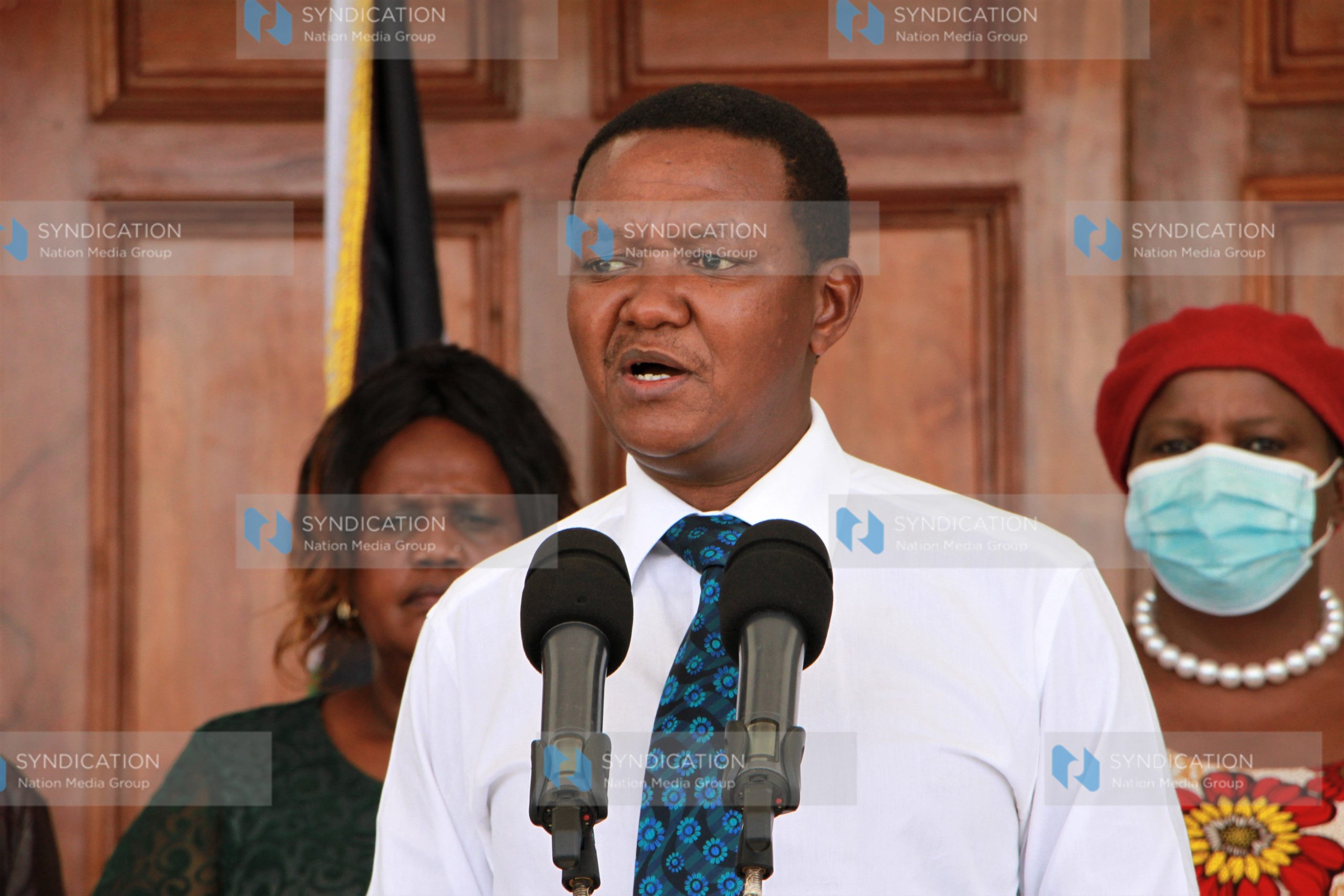 Alfred Mutua gestures while chatting with a section of Machakos MCAs