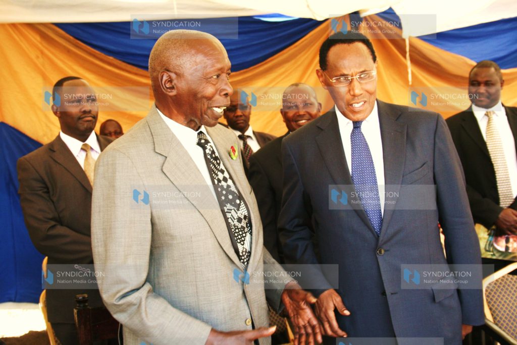 Former President Daniel Arap Moi has a chat with his former Vice President Prof. George Saitoti