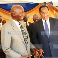 Former President Daniel Arap Moi has a chat with his former Vice President Prof. George Saitoti