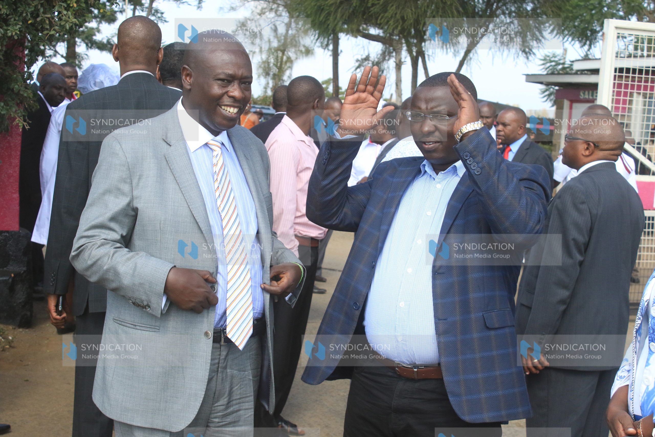 Mathira MP Peter Weru, right, chats with his political rival Rigathi Gachagua