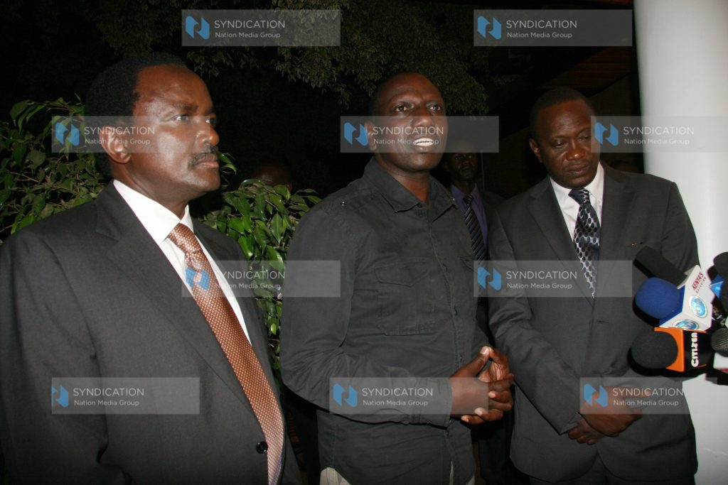 William Ruto flanked by the Vice President Kalonzo Musyoka and Uhuru Kenyatta