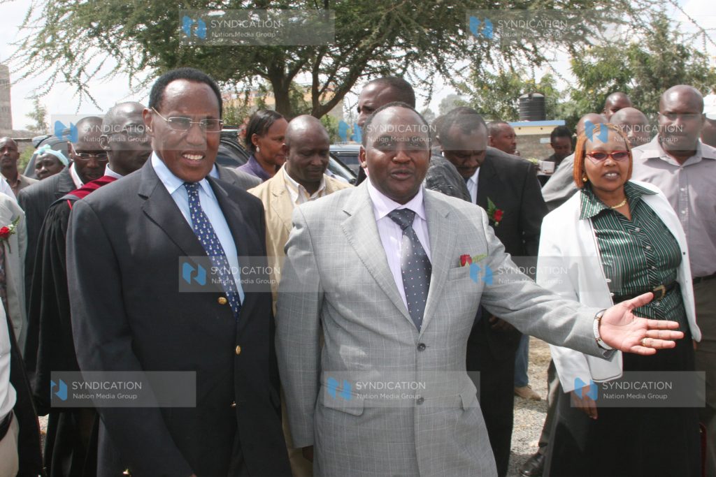 Internal Security Minister Professor George Saitoti, being welcomed by a Church elder Mr. Raphael Kapai