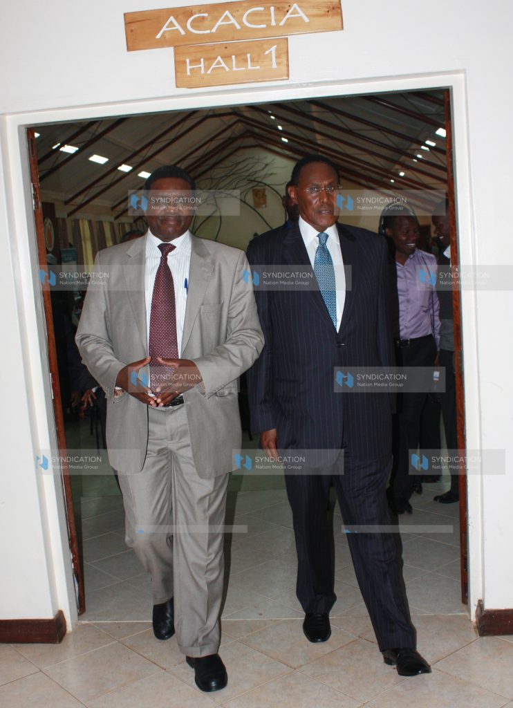 Internal security Minister George Saitoti with NCCK secretary general Canon Peter Karanja