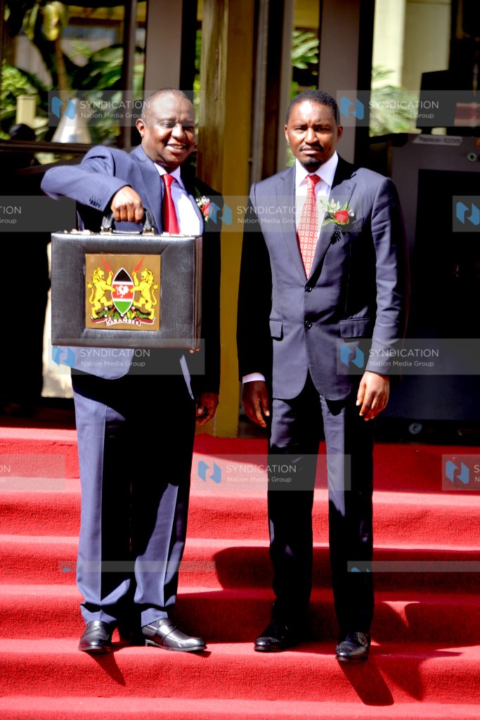 Henry Rotich (left) and his Devolution and Planning counterpart Mwangi Kiunjuri