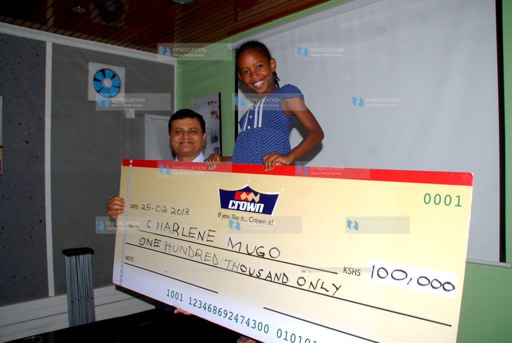 Dummy check of Ksh. 100,000 to nine year-old Charlene Mugo