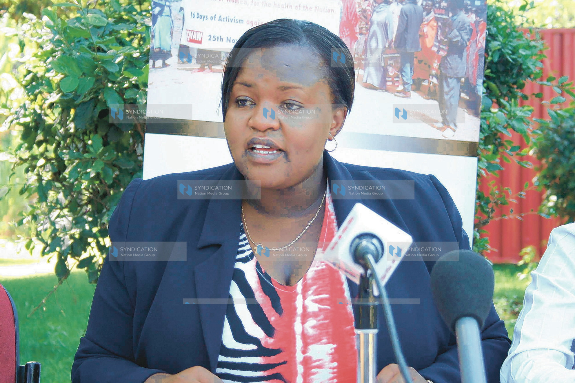 Faith Kasiva addresses the press